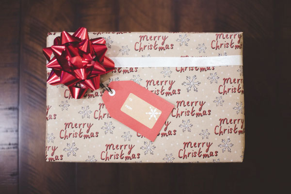 Christmas gift on wooden table