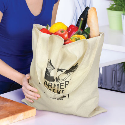 Promotional folding tote bag on table