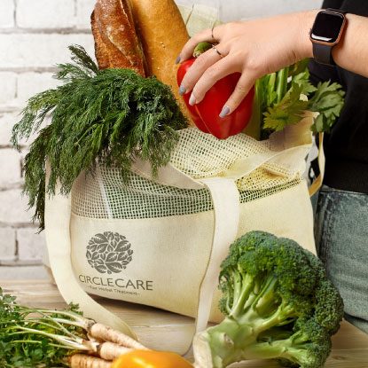 Promotional shopping bag filled with groceries and food