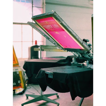 Screen printing machine set up ready to print t-shirt