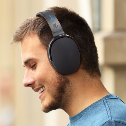 Man wearing headphones with logo