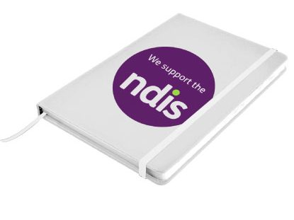 White notebook with we support the NDIS logo