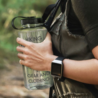 Man holding promotional hiking drink bottle