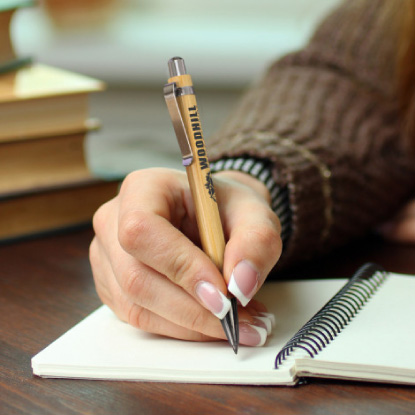 Using a wooden promotional pen