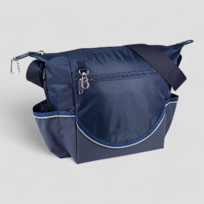 Navy blue Crib bag with front zippered pocket and side pockets.