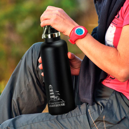 Woman holding a black promotional metal bottle