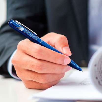 Man holding blue promotional pen