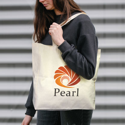 Woman holding promotional recycled cotton tote bag