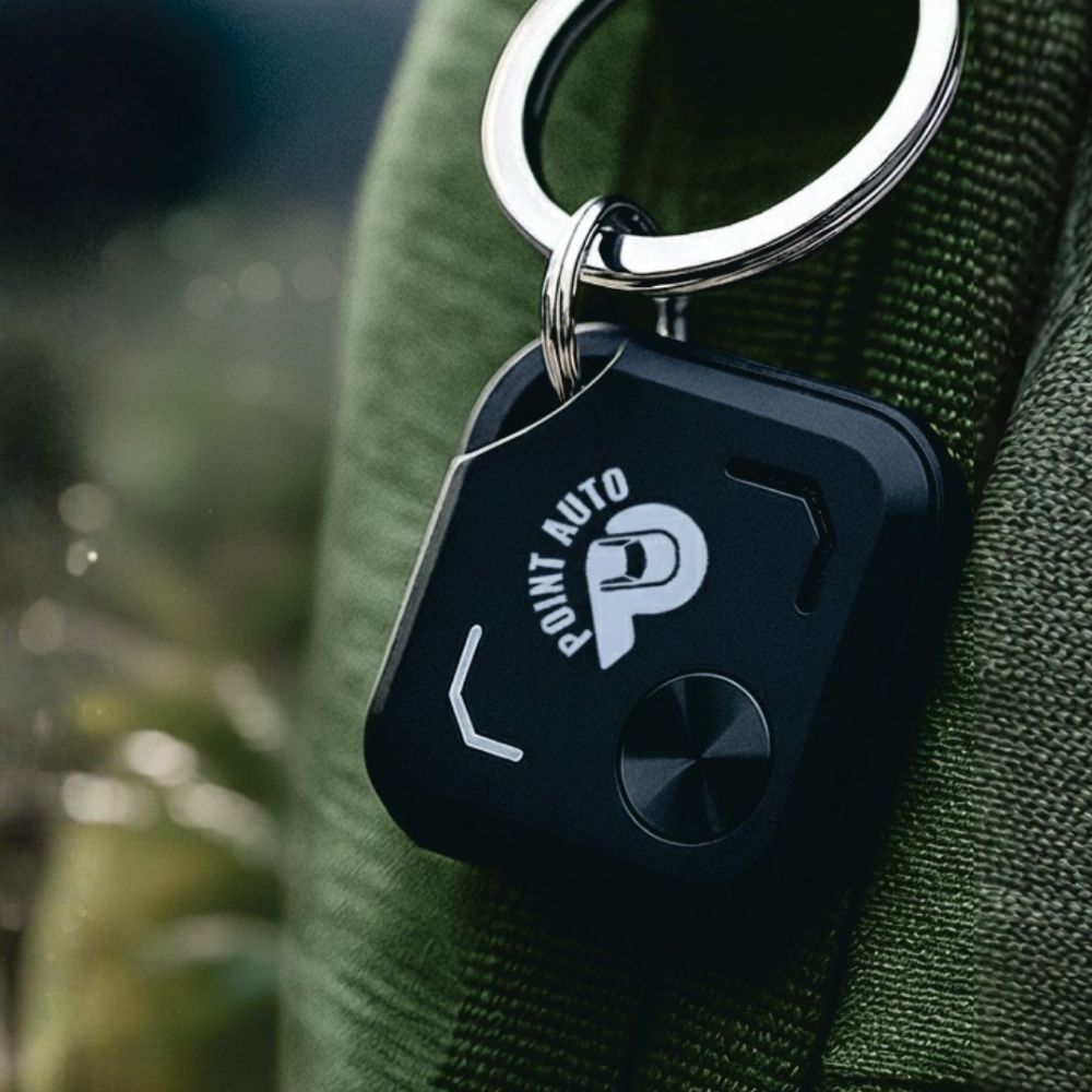Branded Promotional Keyring for Everyday Brand Exposure Branded black promotional keyring attached to a bag, showing a practical everyday merchandise item that keeps a brand visible and supports customer referral marketing.
