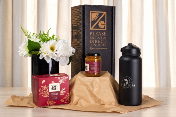 Premium corporate Christmas hamper with branded drink bottle, Christmas pudding and gourmet treats for client and employee gifting in Australia.
