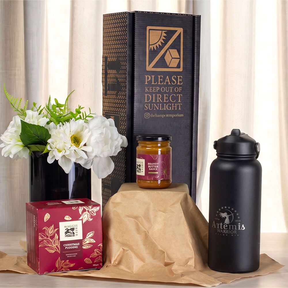Corporate Christmas Gift Hamper with Branded Drink Bottle Corporate Christmas gift hamper with branded drink bottle, Christmas pudding and gourmet food, presented as a premium client gift.