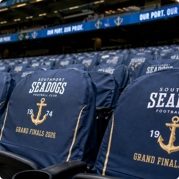 Branded Seadogs event merchandise on stadium seats